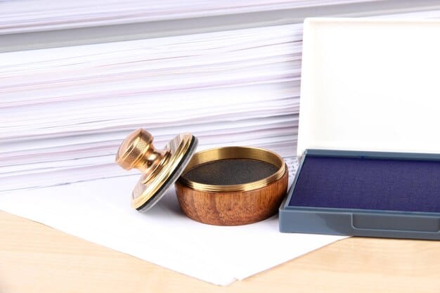 A gavel resting on a stack of legal documents related to immigration law, symbolizing the Supreme Court's authority and the legal context of the ruling. The image is shot in a dimly lit, serious setting.