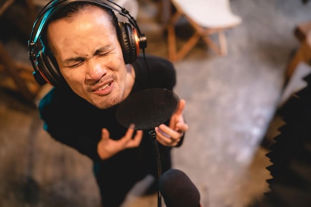A close-up shot of a voice actor in a professional recording booth, headphones on, passionately delivering lines. The focus is on their face and the microphone, capturing the intensity and emotional expression of their performance.