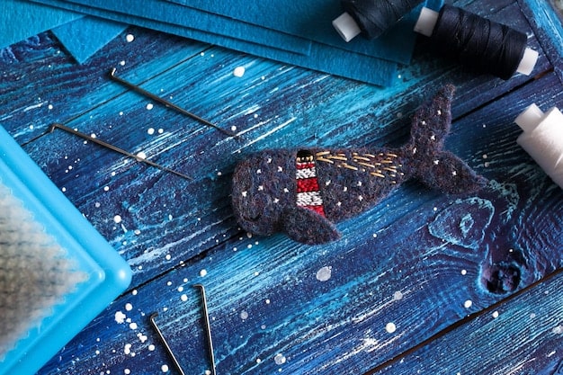 A close-up shot of detailed cosplay armor being crafted. The image shows various tools and materials, such as EVA foam, cutting mats, and paint, highlighting the intricacy of the process.