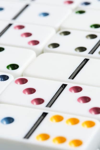 A close-up shot of a modern board game setup, showcasing intricate game pieces, colorful cards, and a detailed game board. The focus is on the visual appeal and complexity of the game components, highlighting the evolution of board game design.