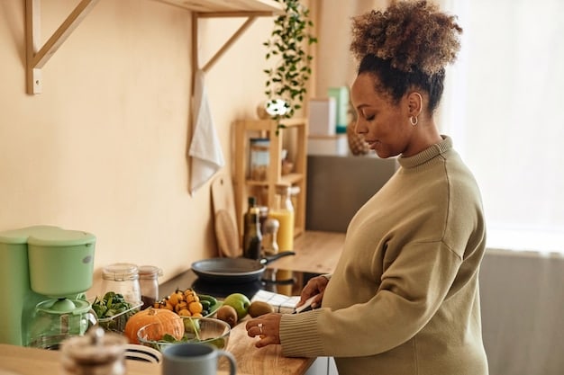 A person cooking a meal in a home kitchen. The kitchen is well-lit and organized, with fresh ingredients on the counter. The person is smiling, conveying the idea that cooking at home can be both economical and enjoyable.