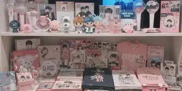 Diverse collection of K-Drama merchandise and collectibles, including albums, lightsticks, and apparel, reflecting fan spending.