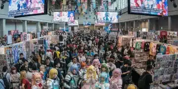 Anime convention attendees enjoying a lively event, diverse cosplay, and vibrant atmosphere.